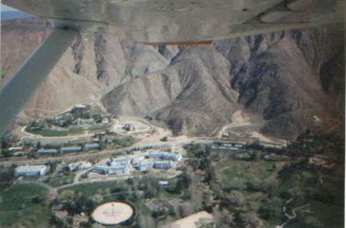 picture of scientology's secretive goldbase taken from the air, showing running pole bottom 1/3rd from left